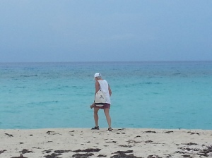 Rhonda walking the beach looking for sea glass 